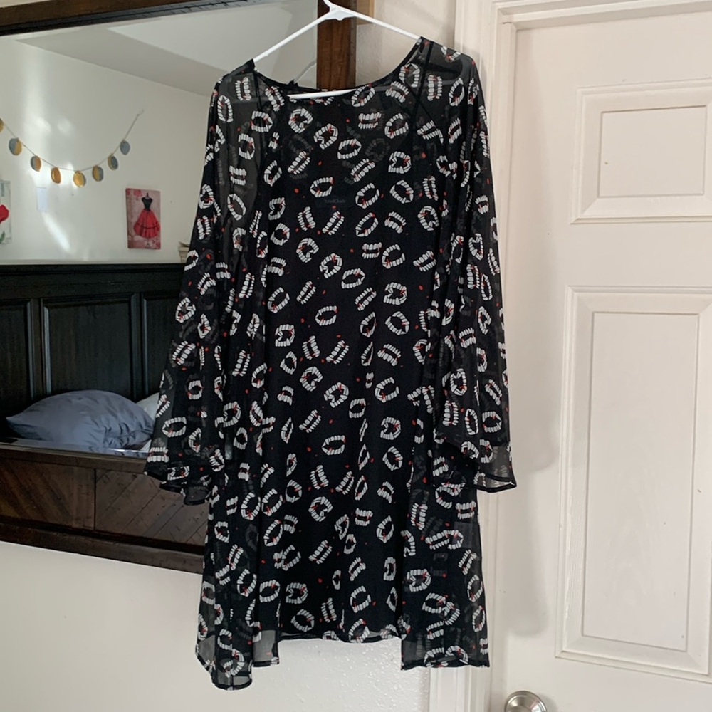 Vampire teeth ModCloth bell sleeved dress